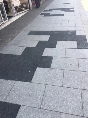 Brentwood High Street, Oxfam, non-paving slab poor eyesore repair