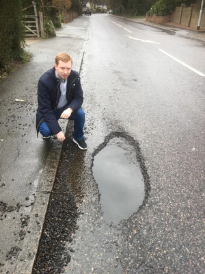 Brenner with one of the potholes