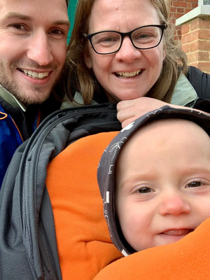 Councillors Sarah Cloke and Dominic Naylor with son Francis at the Town Hall after completing the 5K Race for Life