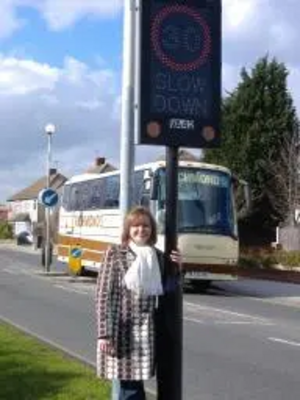 Cllr Chilvers with a Vehicle Activated Sign in Havering