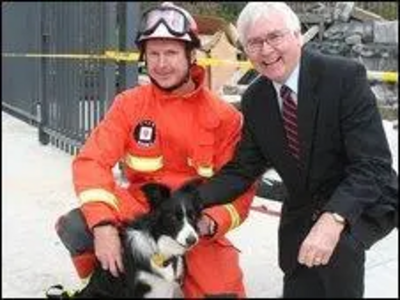 Darcy with handler John Ball and Lib Dem MP for Colchester, Bob Russell