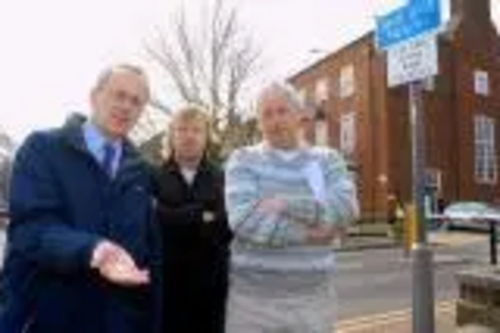 Cllr David Kendall, shop owner Nigel Clarke and Cllr Barry Aspinell.